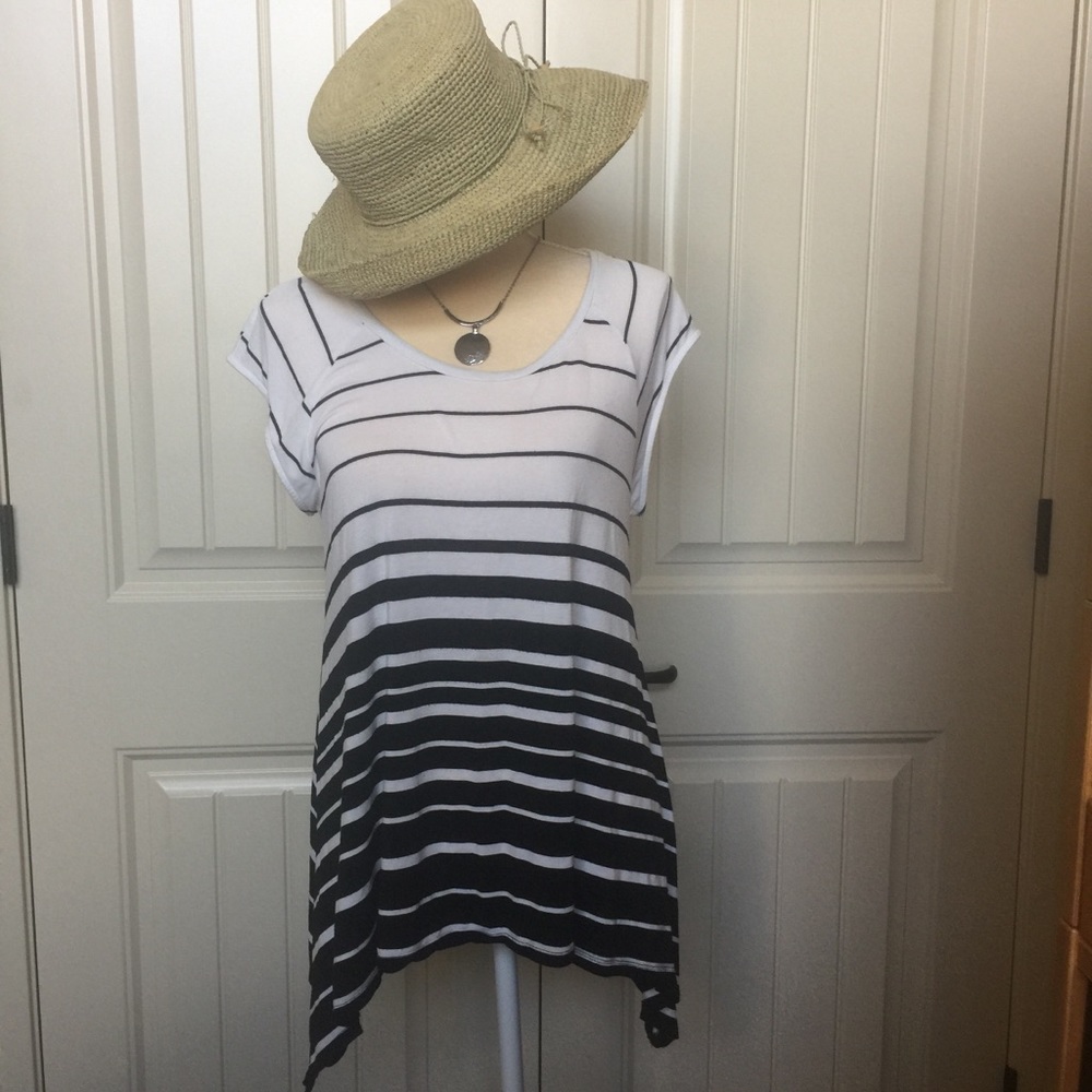 Asymmetrical top in black and white stripes.